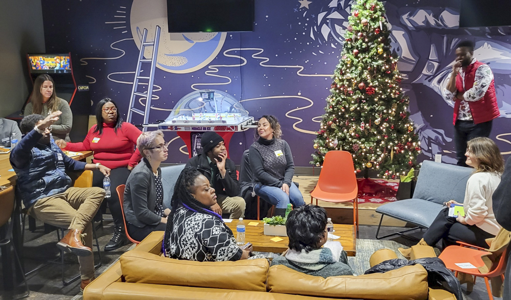 Cleveland Neighborhood Progress economic development group gathers for the organization’s holiday meeting late last year